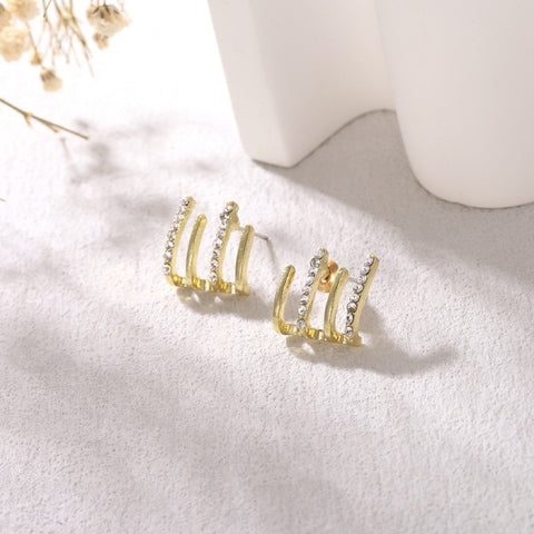 New Curved Claw Earrings With European And American Personality, Simple Symmetrical Diamond Studded Fashionable Four Claw Rake Earrings